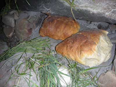 Bread made in primitive stone oven.