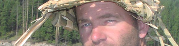 Banner: Thomas in cattail visor.
