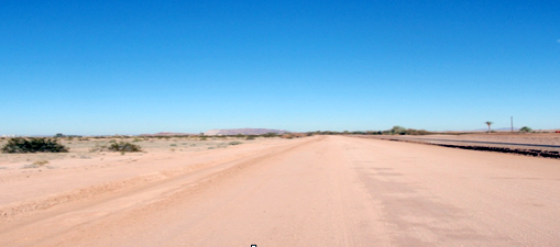 Flat dry sand country.