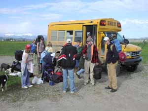 8th Grade Students boarding bus.