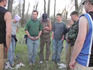 Students learning animal stalking while playing capture the flag.