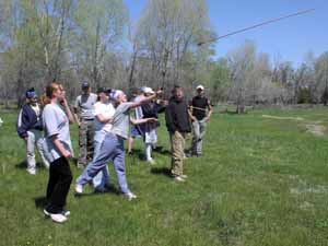 Students learning to throw Atlatl.