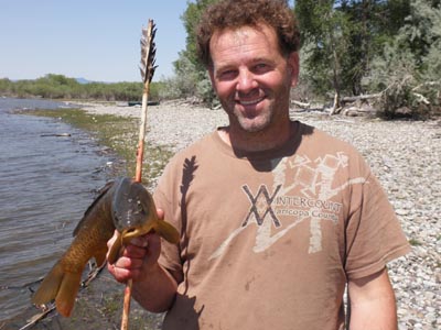 Thomas Elpel with arrow in carp.