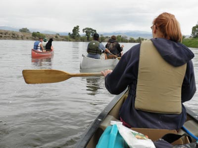 Canoeing to carp hunting grounds.