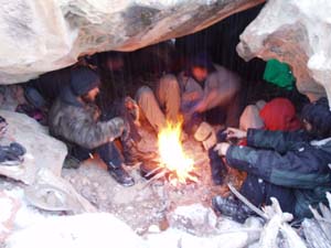 Warming up under boulders.