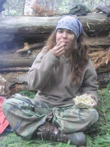 Sherene eating primitive food.